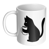 Black_Cat_Holding_Coffee_Mug_11oz_Ceram_LH_Main_Mockup.png