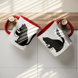 Black_Cat_Holding_Coffee_Mug_11oz_Ceram_Lifestyle_Hanging_Mugs_Mockup.png