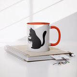 Black_Cat_Holding_Coffee_Mug_11oz_Ceram_Lifestyle_Notebook_Mockup.png
