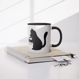 Black_Cat_Holding_Coffee_Mug_11oz_Ceram_Mug_Lifestyle_Notebook_Mockup.png