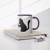 Black_Cat_Holding_Coffee_Mug_11oz_Ceram_Notebook_Mockup.png