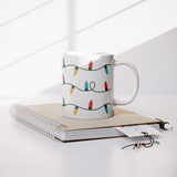 Christmas_Lights_11oz_Coffee_Mug_White__Lifestyle_Notebook_Mockup.png_15680488