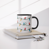 Christmas_Lights_11oz_Coffee_Mug_White__Mug_Lifestyle_Notebook_Mockup.png_15680528