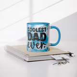 Coolest_Dad_Ever_11oz_Coffee_Mug_White_o_Lifestyle_Notebook_Mockup.png_15615643