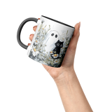 Cute_Ghost_and_Black_Cat_in_Field_of_Dai_Accent_Mug_Raised_Hand_LH_Mockup.png