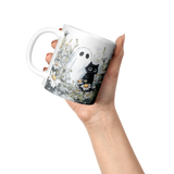 Cute_Ghost_and_Black_Cat_in_Field_of_Dai_Lifestyle_Raised_Hand_LH_Mockup.png