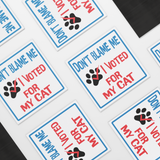 Dont_Blame_Me_I_Voted_for_My_Cat_Car_M_SquareCarMagnet_Scattered_Mockup.png