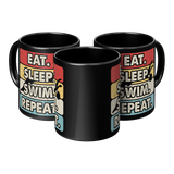 Eat_Sleep_Swim_Repeat_11oz_Ceramic_Bl_3pc_Triangle_View_Mockup.png_15683546