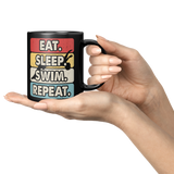 Eat_Sleep_Swim_Repeat_11oz_Ceramic_Bl_Lifestyle_Presentation_Hands_Mockup.png_15683551