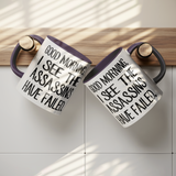 Good_Morning_I_See_the_Assassins_Have_F_Hanging_Mugs_Mockup.png