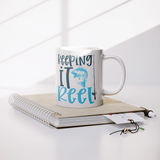 Keeping_it_Reel_11oz_Fishing_Coffee_Mugm_Lifestyle_Notebook_Mockup.png_15616110