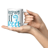 Keeping_it_Reel_11oz_Fishing_Coffee_Mugm_Lifestyle_Presentation_Mockup.png_15616111