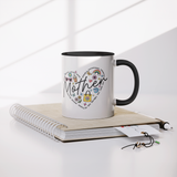 Mother_Heart_Defining_Words_11oz_Coffee__Mug_Lifestyle_Notebook_Mockup.png_15660689
