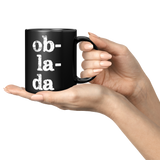 Ob_La_Di_Ob_La_Da_11_oz_Black_Coffee_Mug_Lifestyle_Presentation_Hands_Mockup.png_15559208