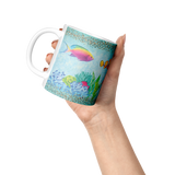 Under_the_Sea_11oz_Coffee_Mug_Lifestyle_Raised_Hand_LH_Mockup.png