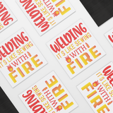 Welding_is_Like_Sewing_with_Fire_Car_Mag_SquareCarMagnet_Scattered_Mockup.png